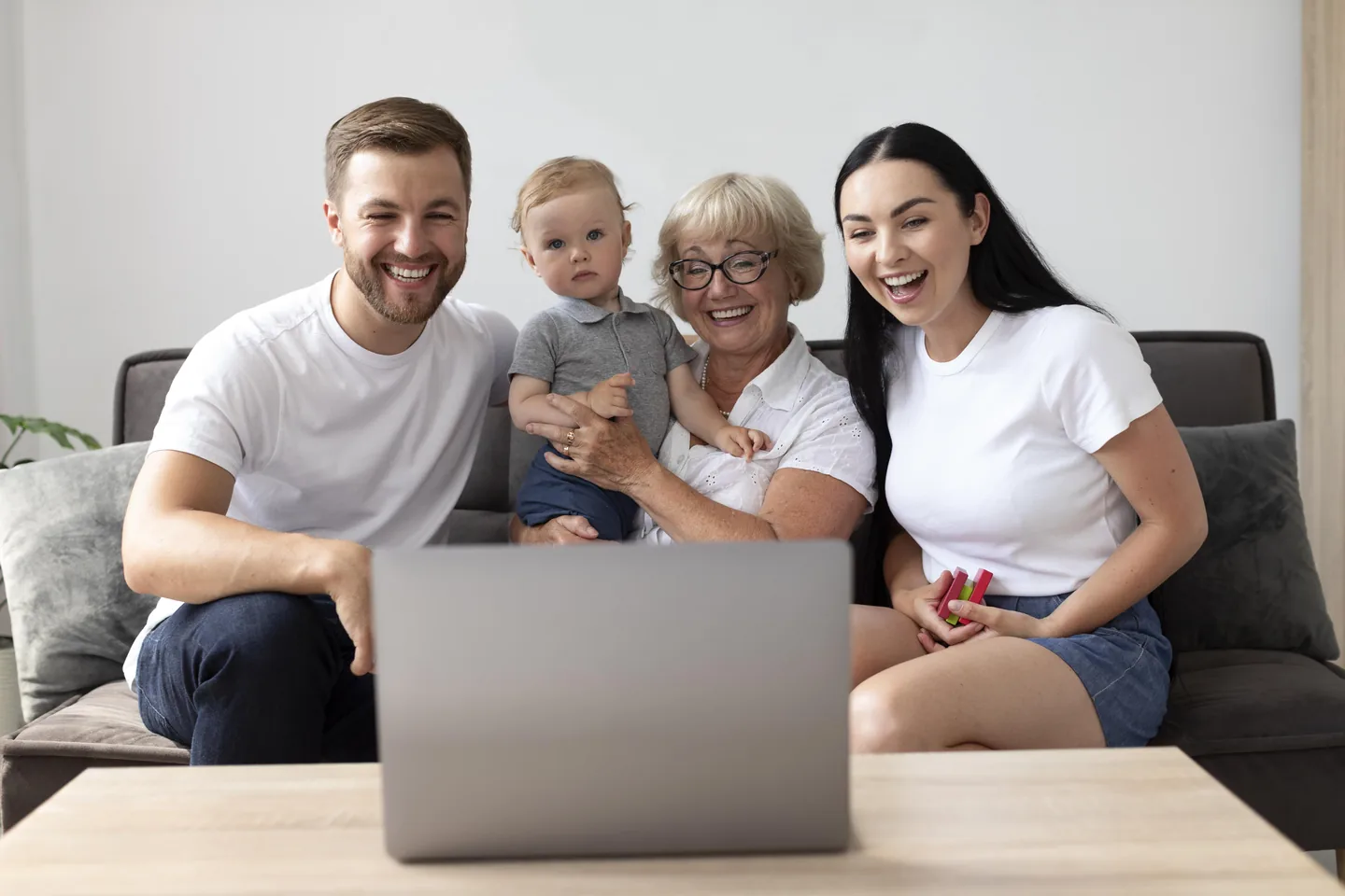 Family having a video call together at home